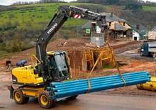Excavatrice sur pneus Volvo EW140C