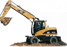 Excavatrice sur pneus Caterpillar M 313 C Mono