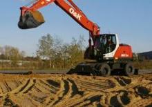 Excavatrice sur pneus O&K MH 5.6