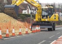 Excavatrice sur pneus Komatsu PW180-7E0