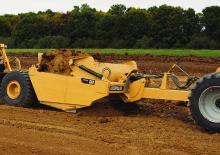 Scrapeurs Caterpillar TS185