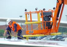 Nacelles à bras articulés sur roues JLG 740 AJ